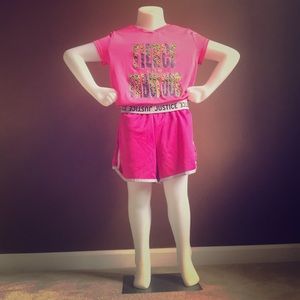 A pair of pink and white justice shorts